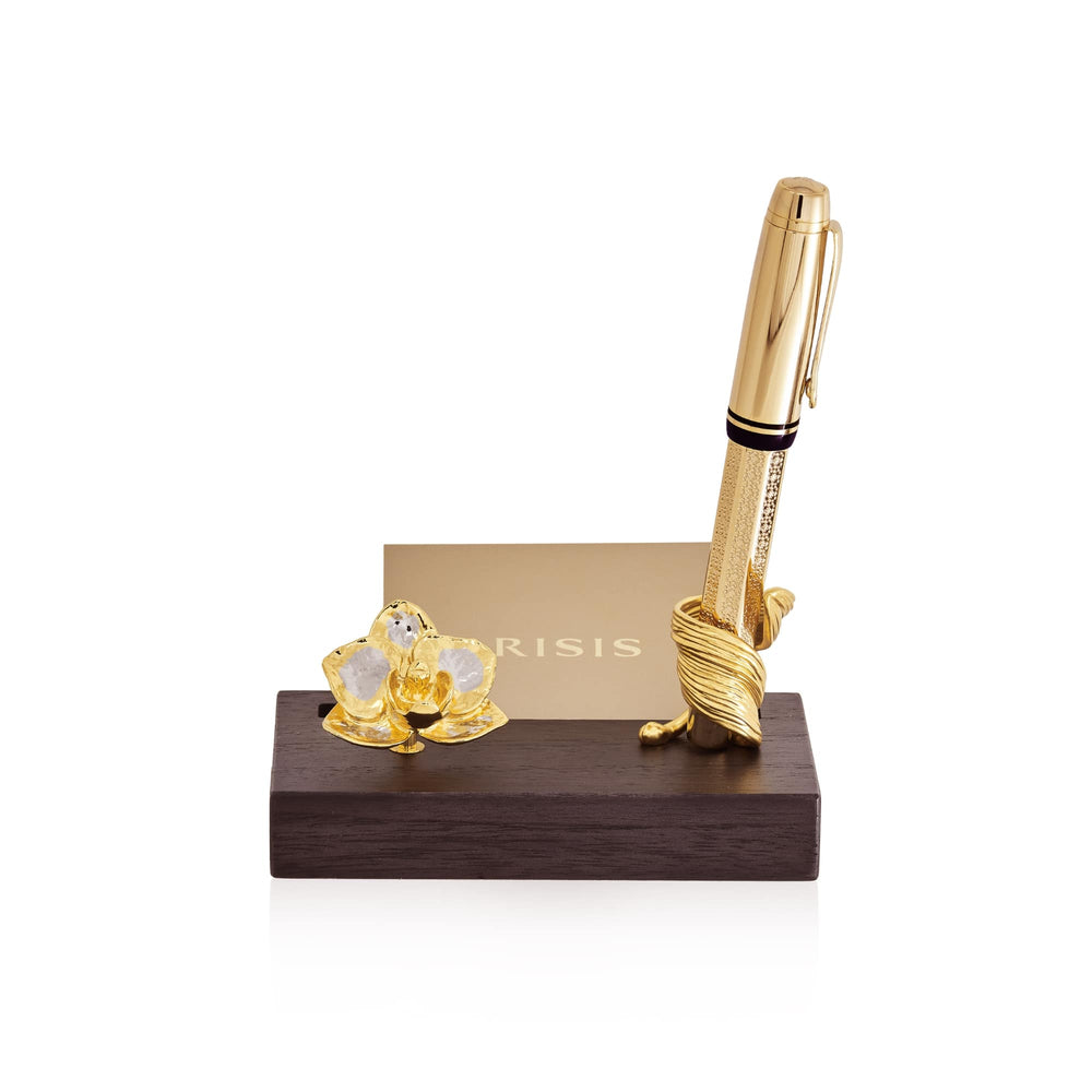 Risis Phalaenopsis Orchid Pen And Name Card Holder - A golden pen with textured detailing stands upright, anchored on a dark wooden base beside a crystal flower with translucent and yellow petals.