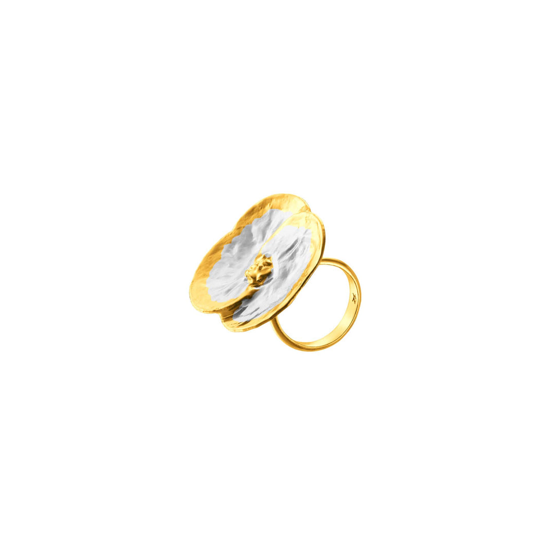 Risis Promesse Ring (RHG) - A ring with a gold band and a large, flat, reflective, gold-rimmed disc on top displaying nacreous shades of white and gray.