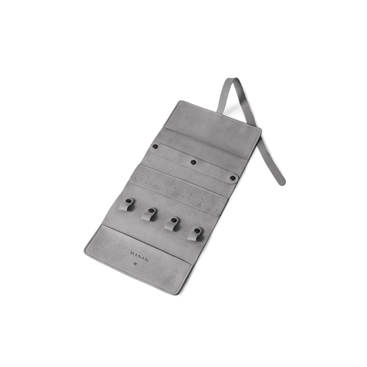 Risis Jewellery Travel Pouch - A grey jewelry organizer with multiple rows of holes and pouches for holding various items, featuring a minimalist design.