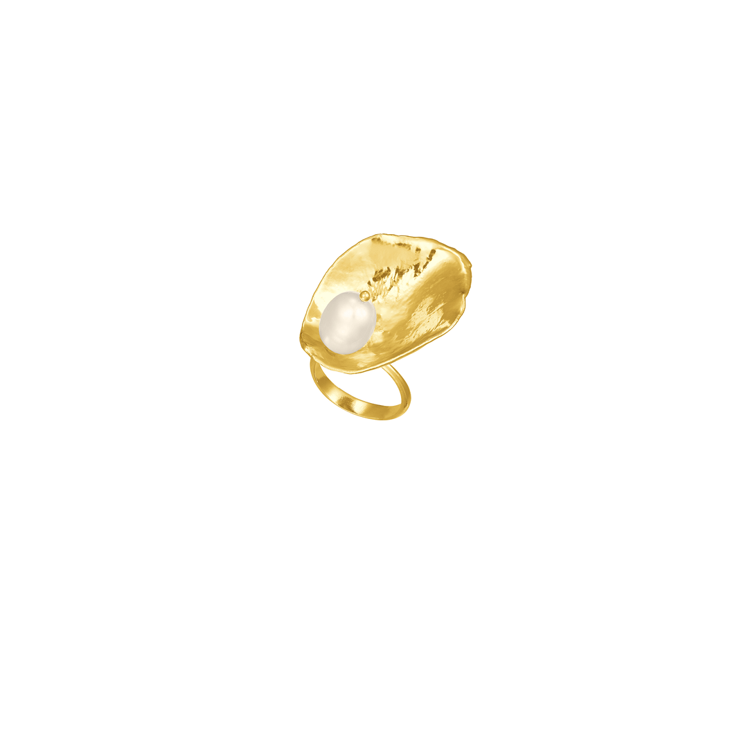 Risis Rose Petal Ring with Pearl - A gold ring with a textured, irregular oval surface, highlighted by a central, lustrous white pearl.