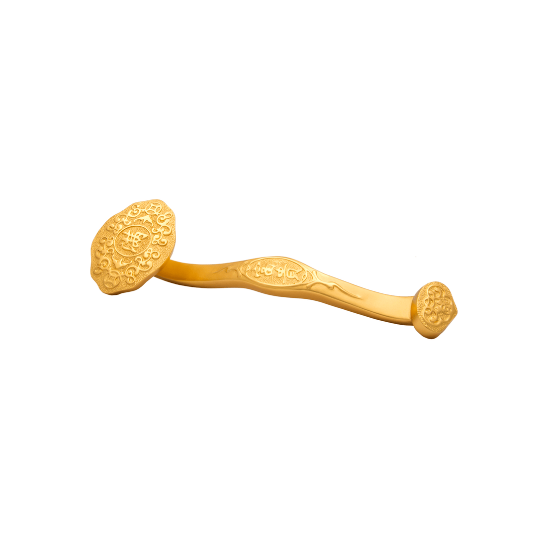 Risis Ruyi Scepter - A golden, ornately engraved hairpin with intricate patterns and symmetrical, rounded ends against a plain backdrop.