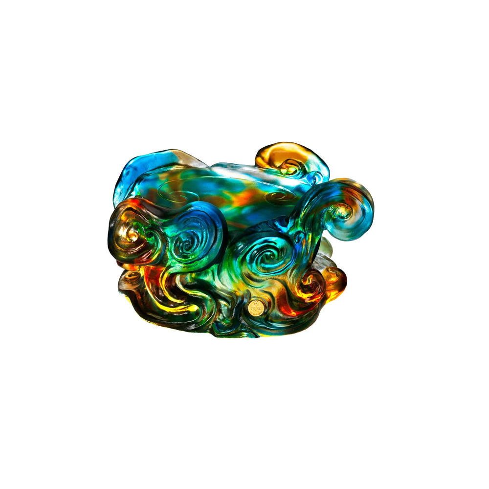 Risis The Imperial Dragon on Blue Liu Li - A vibrant, multicolored glass object with swirls of blue, green, gold, and amber, exuding an artistic and ornamental quality.
