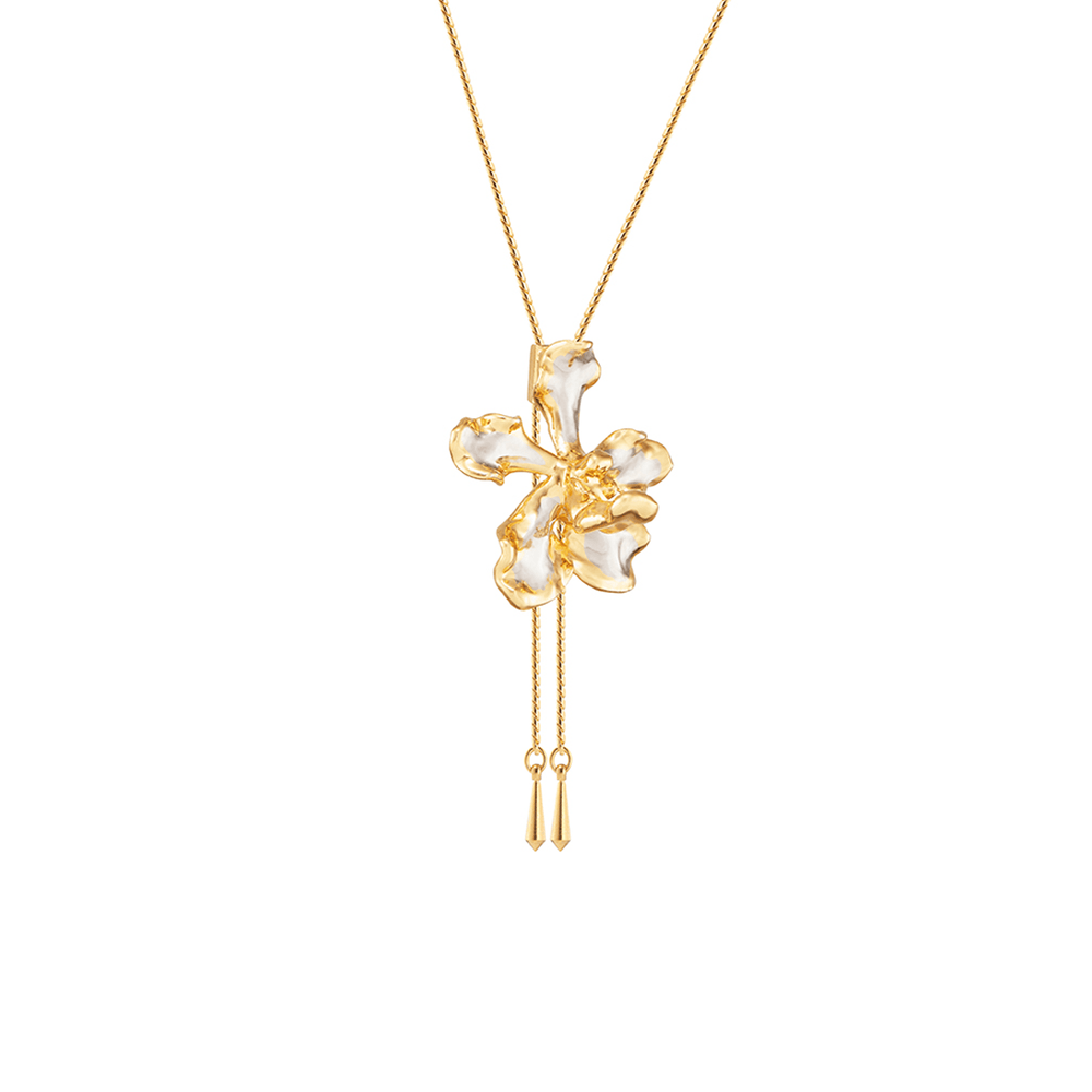Risis Vanda Wee Kim Lian Orchid Slider Necklace (PG) - A golden necklace featuring a glossy, irregular-shaped pendant resembling a flower, with shimmering white accents and dangling slender golden chains ending in tiny cones.