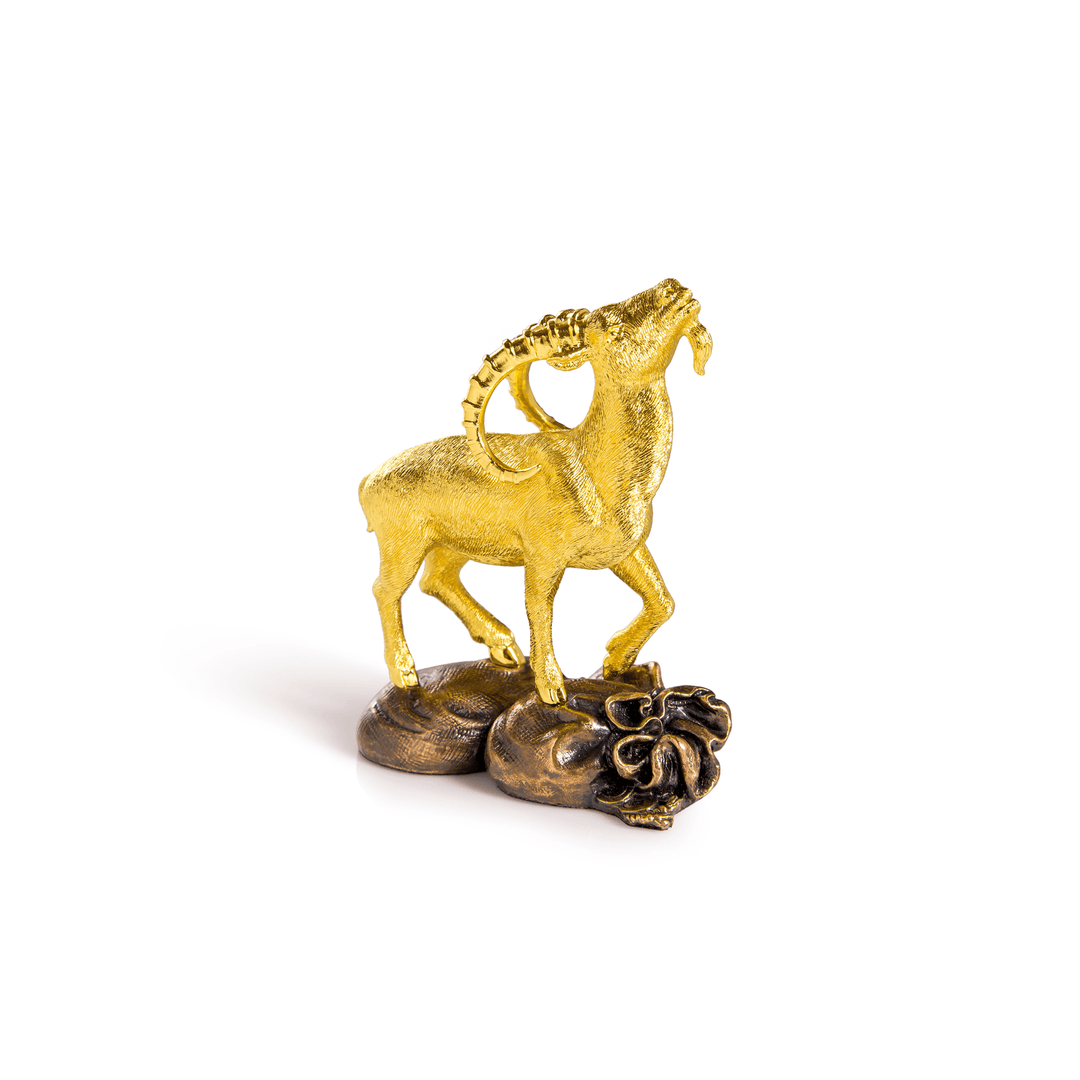 Risis Wealth Goat - A golden sculpture of a robust, rearing horse with intricate textures stands on a floral base, portraying dynamic motion and elegance.